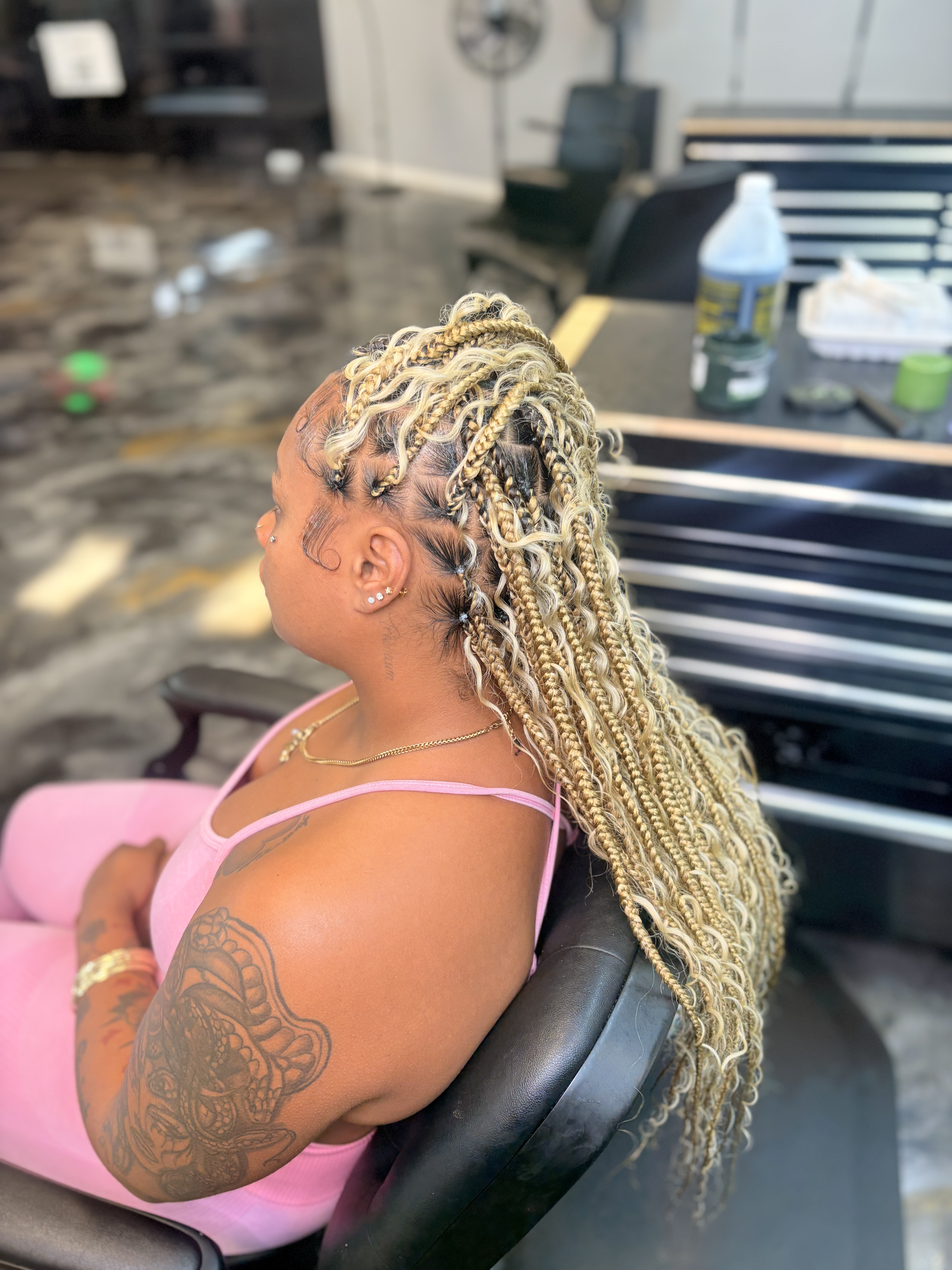 Braided style by Richebeaute Hair