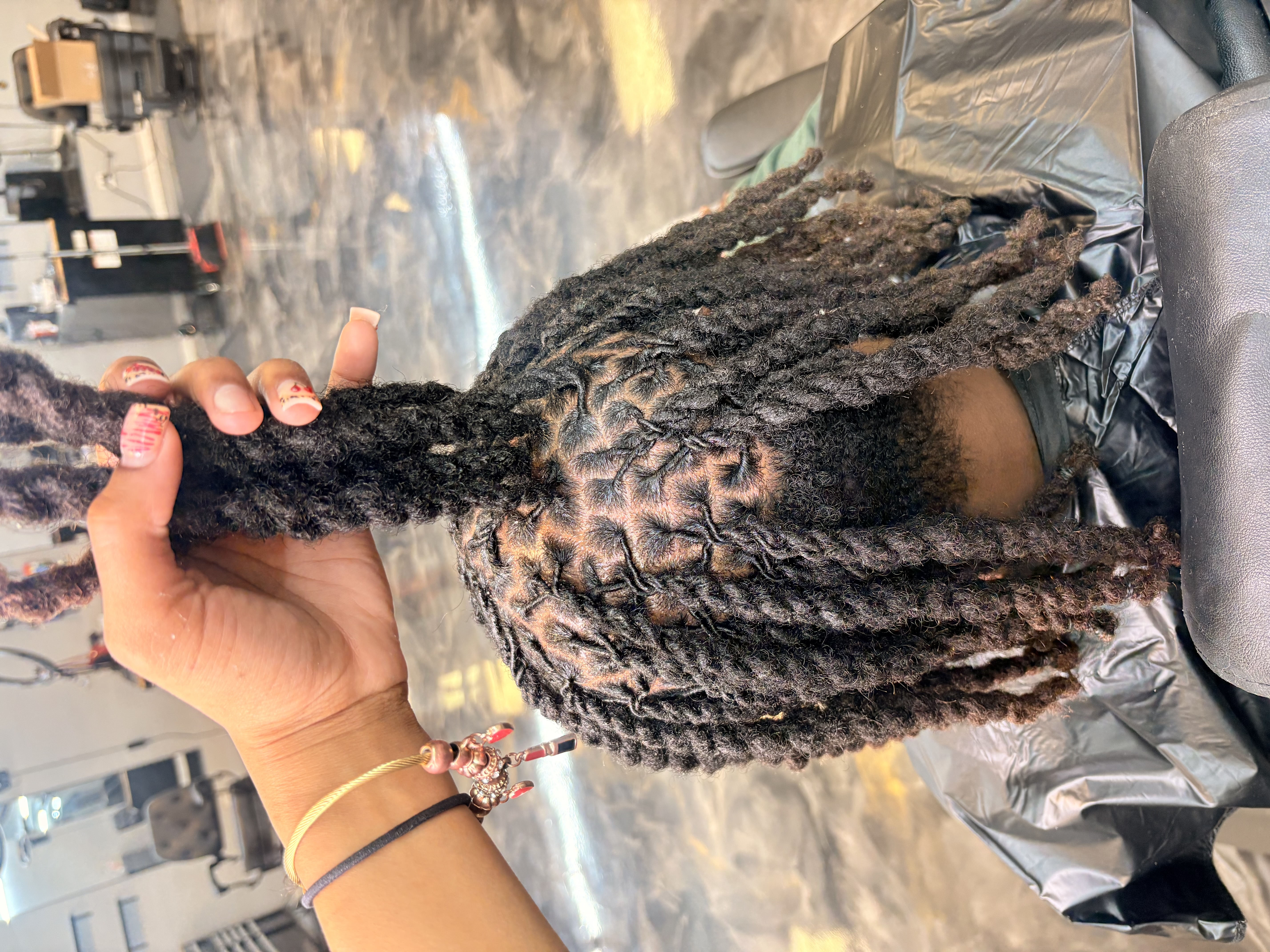 Braided style by Richebeaute Hair