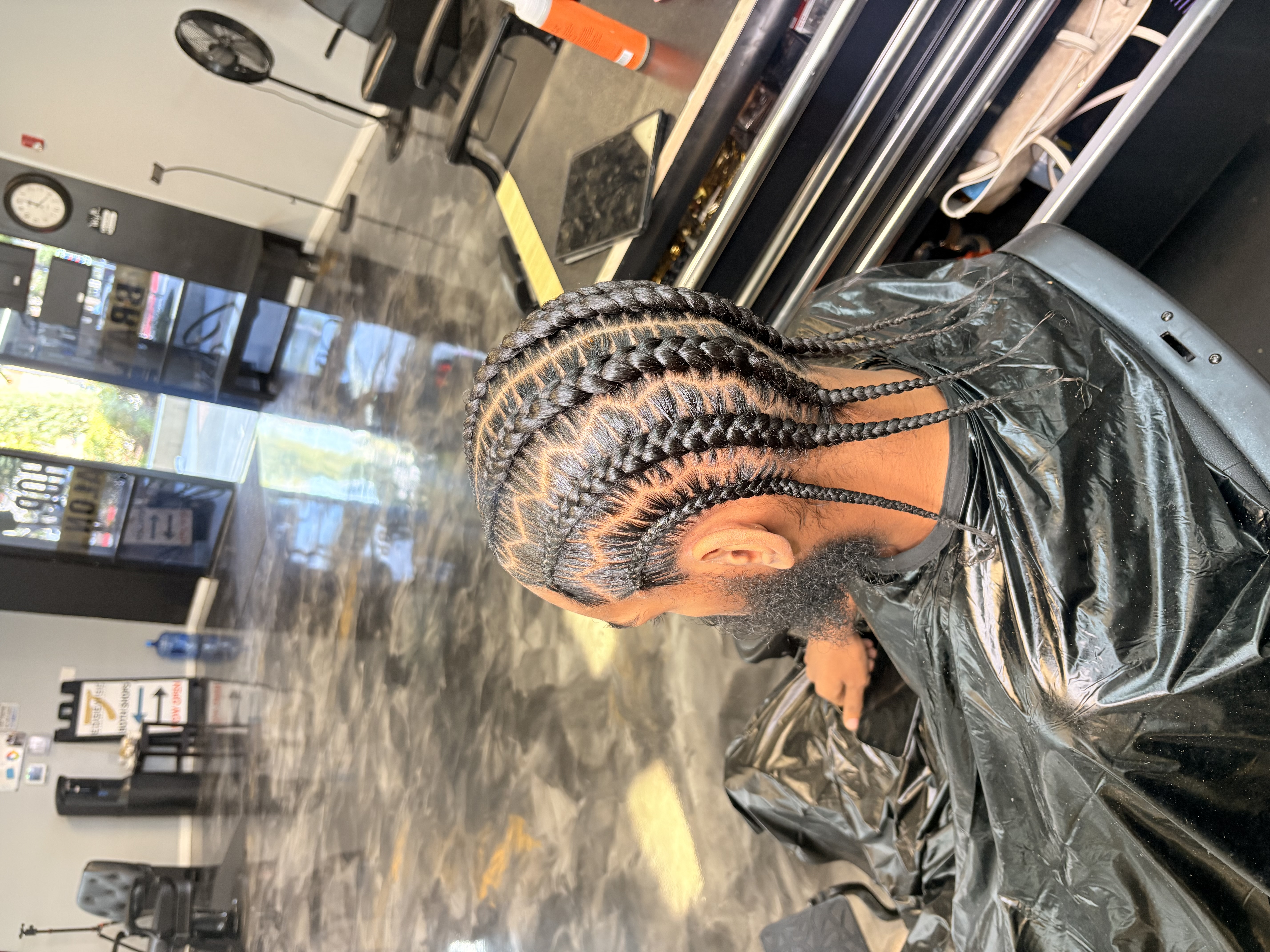 Braided style by Richebeaute Hair