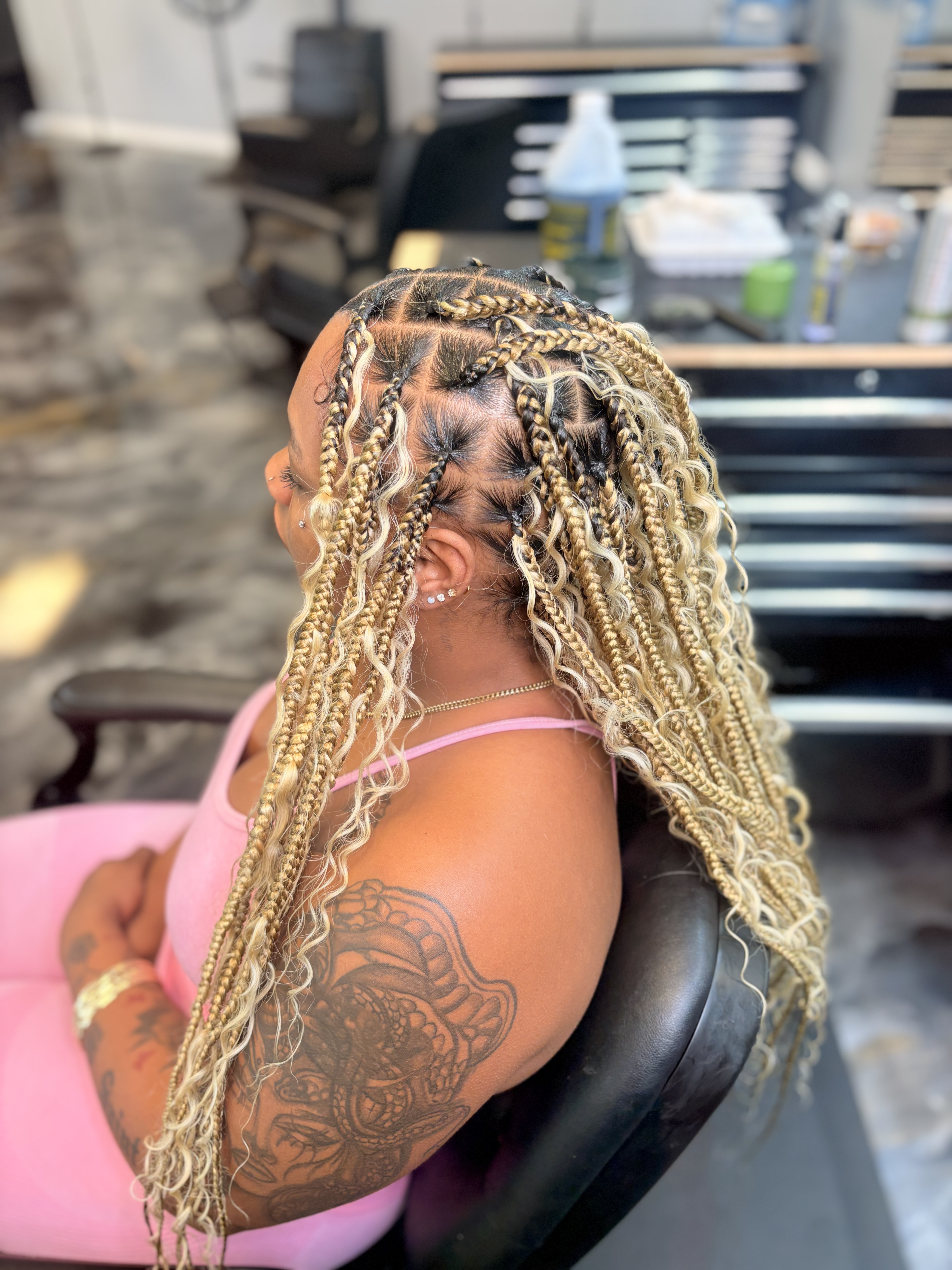 Braided style by Richebeaute Hair